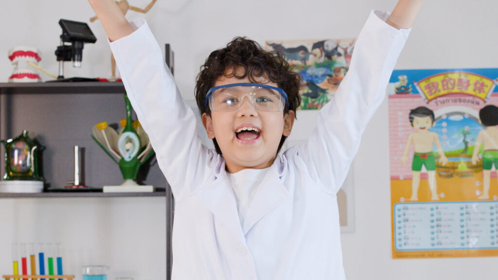 A child is learning and is very happy and joyful
